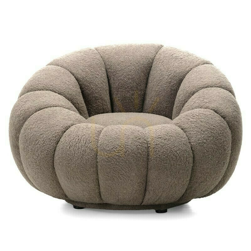 FLOWER armchair in cappuccino, with a swivel base, bouclé fabric, and rounded shapes by Nova Nook
